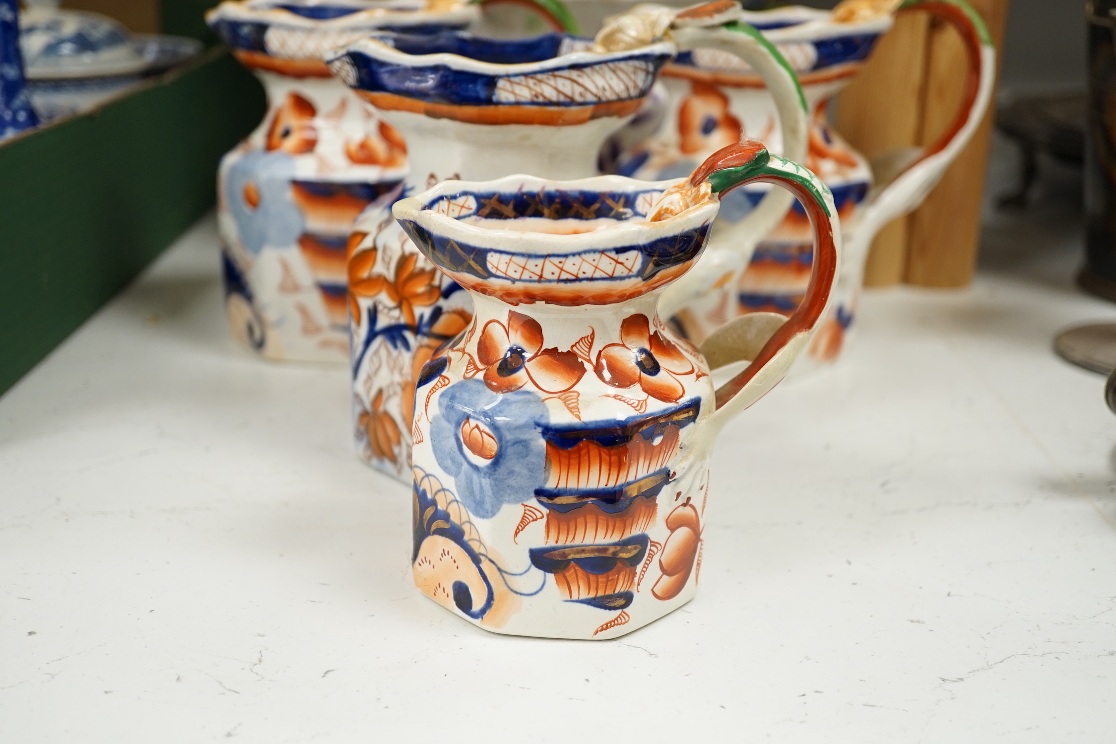 Four early 19th century 'Ironstone China' Imari jugs, a Masons ironstone tureen and a chamber pot (6)